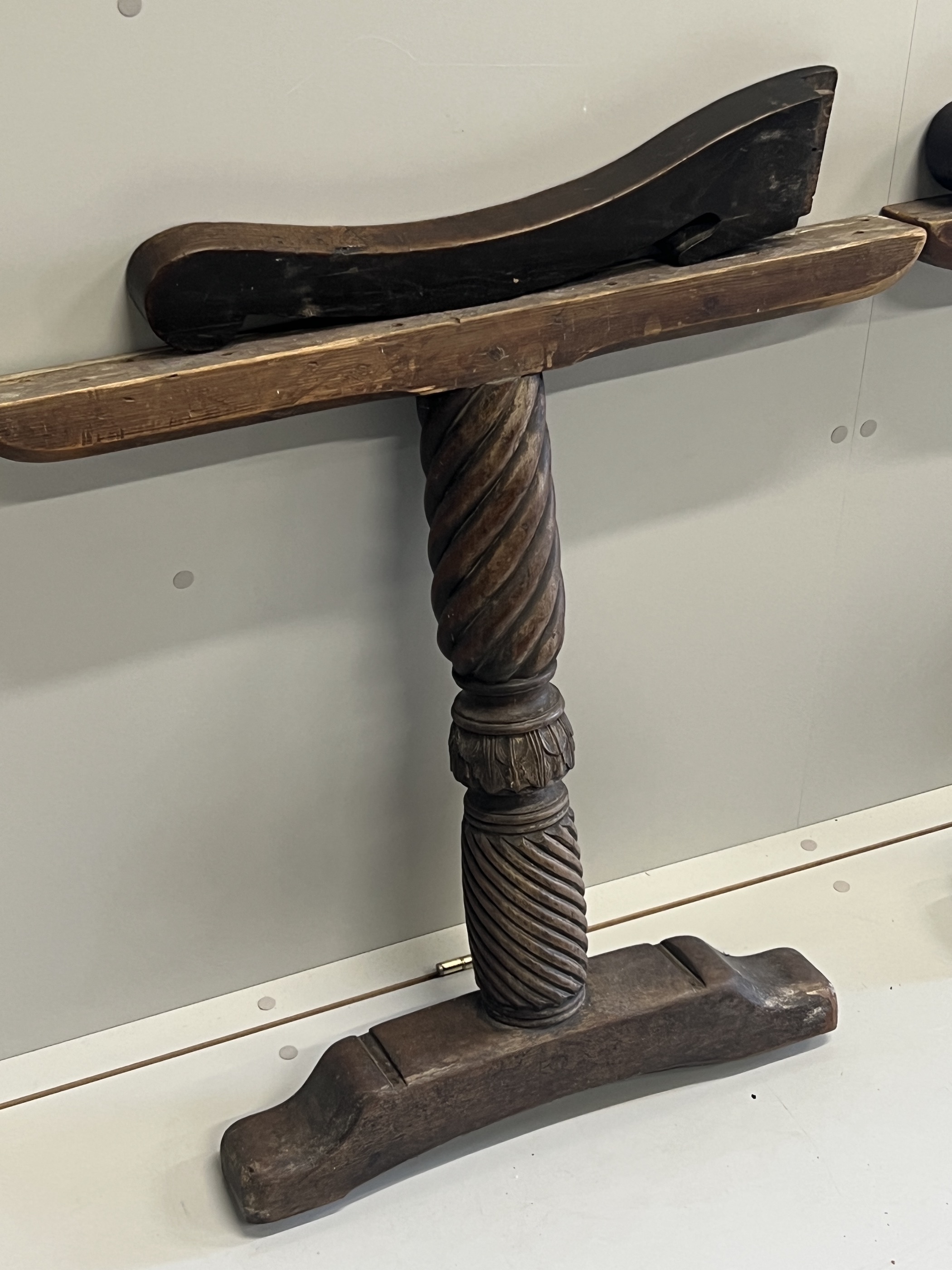 A pair of 17th century oak Wainscot chair arms together with a pair of turned walnut table supports